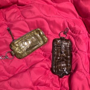 Brighton cars holder with zip compartment.